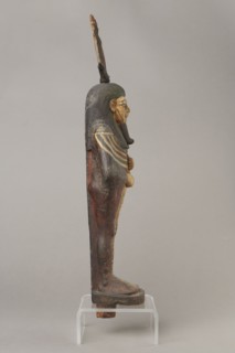 Osiris, Figurine in the form of a human mummy wearing a hemhem crown with ram's horns. On the chest