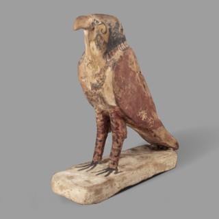 Figurine of the falcon Sokaris, guardian of the necropolis; Horus mythology. A falcon stands on a