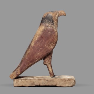 Figurine of the falcon Sokaris, guardian of the necropolis; creator, Horus mythology. A falcon