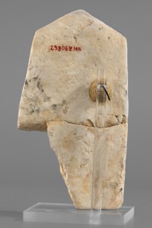 Naos stele with a female figure, Small naos-shaped stele, slightly tapered at the top and