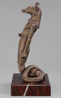 The god Anubis in the form of a jackal-headed deity; Anubis mythology. Figurine of Anubis in the