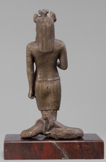 The god Anubis in the form of a jackal-headed deity, Anubis mythology. Figurine of Anubis in the
