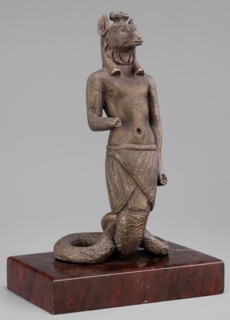 The god Anubis in the form of a jackal-headed deity, Anubis mythology. Figurine of Anubis in the