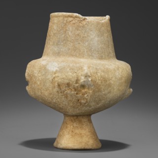 Stone vessel kandila, Body shaped as a flattened hemisphere with four evenly spaced, ribbed