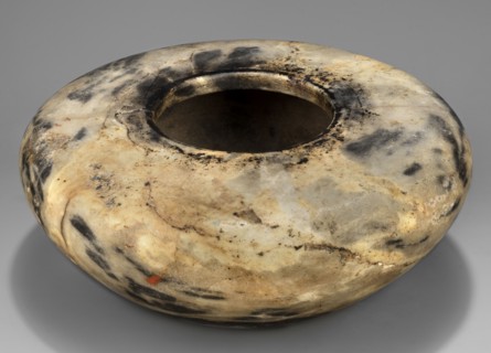 Stone vessel, Stone vessel in the shape of a bird's nest with flat, broad shoulders, a small spout