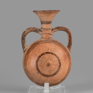 Bottle amphoriskos, Amphora with a round, slightly flattened flask-like belly. Brown-black