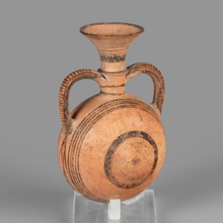 Bottle amphoriskos, Amphora with a round, slightly flattened flask-like belly. Brown-black