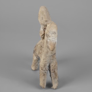 Figurine of a rider on a horse, Cyprus. The entire piece is schematic, the overall shape is