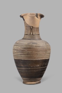 Oinochoe, Geometric oinochoe with a low foot, a gradually widening belly, distinct shoulders, a