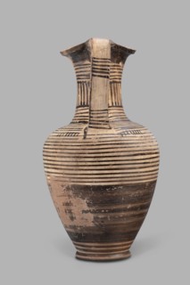 Oinochoe, Geometric oinochoe with a low foot, a gradually widening belly, distinct shoulders, a