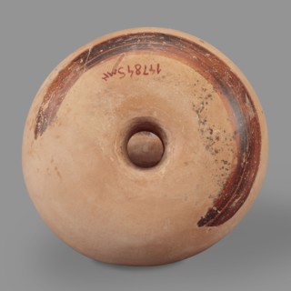 Askos, This ring-shaped askos incomplete, with visible restoration has a body tapering toward the