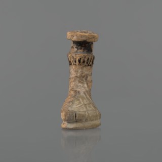 Foot-shaped aryballos, Ionian workshop, aryballos, antique vessel. Yellow-orange clay with mica;