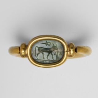 Ring with a scarab and a cryptogram of Amun. Amun mythology, ankh iconography, plant decorations;