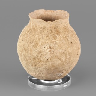 Spherical vessel, unknown Northern Mesopotamian workshop; hand-made miniature spherical vessel with