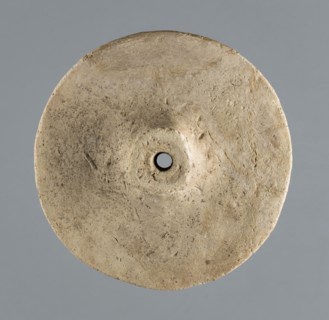 Wheel from a model wagon, unknown northern Mesopotamian workshop, terracotta model wheel with a