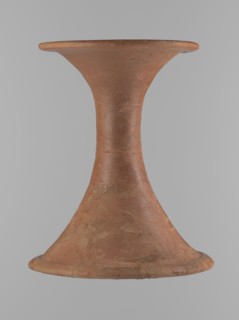Vessel base. Funnel-shaped vessel base, narrowest at about 2/3 of the height. Both rims are oval in