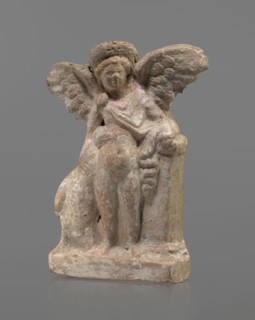 Terracotta figurine of Eros with a goose. Terracotta; figurine of a standing Eros. The figure,