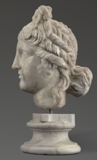 Head of the goddess Aphrodite;, Greek sculpture, female portrait; hair tied in a bow at the front,
