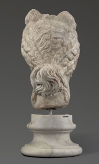 Head of the goddess Aphrodite; maker, Greek sculpture, female portrait; hair tied in a bow at the