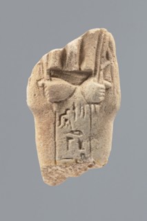 Ushabti - fragment, Mummy-shaped figurine; flat pillar on the back. Preserved central fragment from