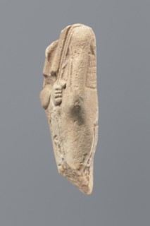 Ushabti - fragment, Mummy-shaped figurine; flat pillar on the back. Preserved central fragment from