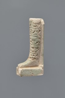 Ushabti - fragment. Mummy-shaped figurine, fragment of the legs preserved from the knees down. On