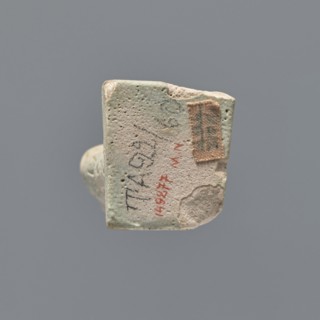 Ushabti fragment, mummy-shaped figurine; fragment of the legs preserved from the knees down. On the