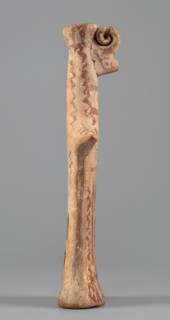Female idol, Female idol with arms marked as appendages. On a long cylindrical neck is a nose and