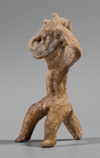 Satyr figurine. Clay figurine depicting a satyr with a face stylized as a mask with protruding ears