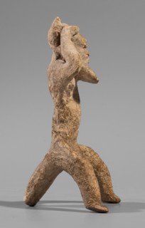 Satyr figurine. Clay figurine depicting a satyr with a face stylized as a mask with protruding ears
