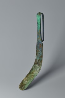 Scraper, Metal scraper with a typical slightly curved shape consisting of a handle and a blade with