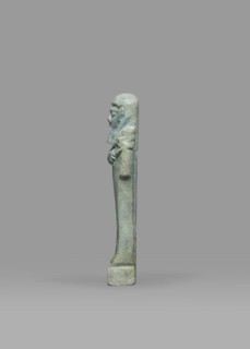Ushabti, Mummy-shaped funerary figurine shabti standing on a base, back supported by a