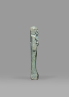 Ushabti, Mummy-shaped funerary figurine shabti, standing on a base, back supported by a