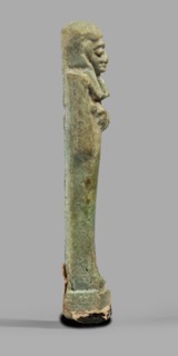 Ushabti, Mummy-shaped funerary figurine standing on a base, back supported by a pillar/pilaster.