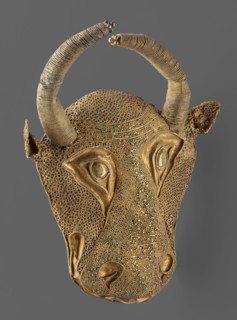 Protoma; bull's head relief mask made in gold using repoussé, granulation, and filigree; eyes,