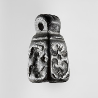 Stamp seal with figural representations. Glyptic, stamp seal in the form of a truncated pyramid on