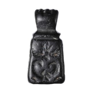 Stamp seal with figural representations. Glyptic stamp seal in the form of a truncated pyramid on a