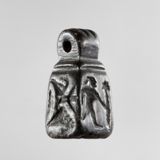 Stamp seal with figural representations. Glyptic stamp seal in the form of a truncated pyramid on a
