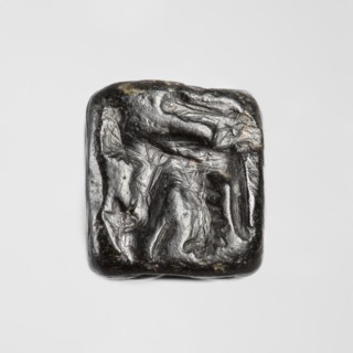 Stamp seal with figural representations. Glyptic stamp seal in the form of a truncated pyramid on a