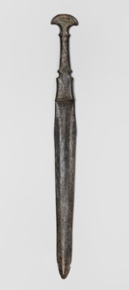 Dagger, unknown Luristan workshop. Dagger with a cast blade and a mushroom-shaped hilt with a