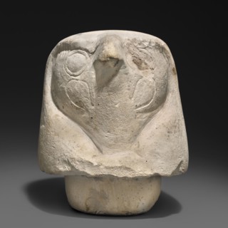Canopic jar lid — falcon head;, Canopic jar lid in the shape of a plastically modeled falcon head,