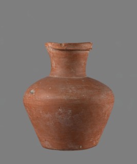 Jug with biconical belly, widest at mid-height; broad, gently sloping shoulders; wide neck slightly