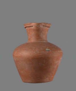 Jug with biconical belly. Vessel is widest at about half its height; broad, not very sloping