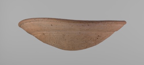 Shallow bowl of rounded, asymmetrical shape with a rounded, flaring, irregular rim. Surface is