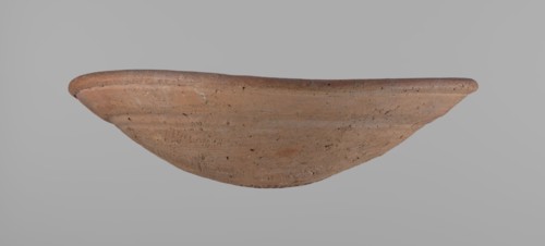 Bowl. Shallow bowl of rounded, asymmetrical shape with a rounded, flaring, irregular rim. Surface