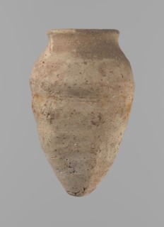 Vessel with hieratic inscription. Conical clay vessel tapering toward the bottom, irregular, widest