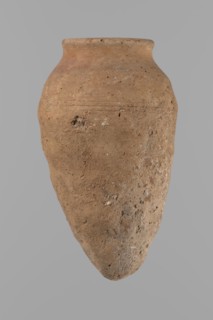 Vessel with hieratic inscription. Conical clay vessel tapering toward the bottom, irregular; widest