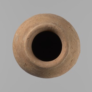 Vessel with hieratic inscription. Hand-made clay vessel, turned in the upper part neck, spout.