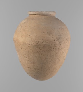 Vessel, Egyptian clay vessel of ovoid, slightly downward-stretched shape, widest at about 2/3 of