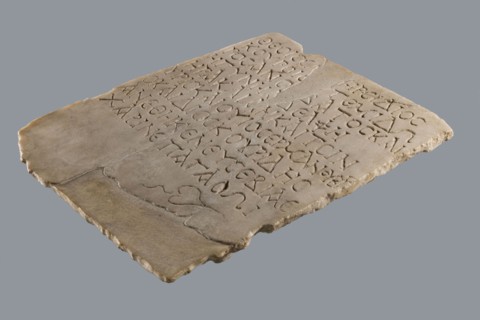 Greek dedicatory inscription, tombstone inscription: To the Savior Gods Dioskuros, Artemidoros son